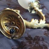 Bronze wall light with opaque glass tulip 1900