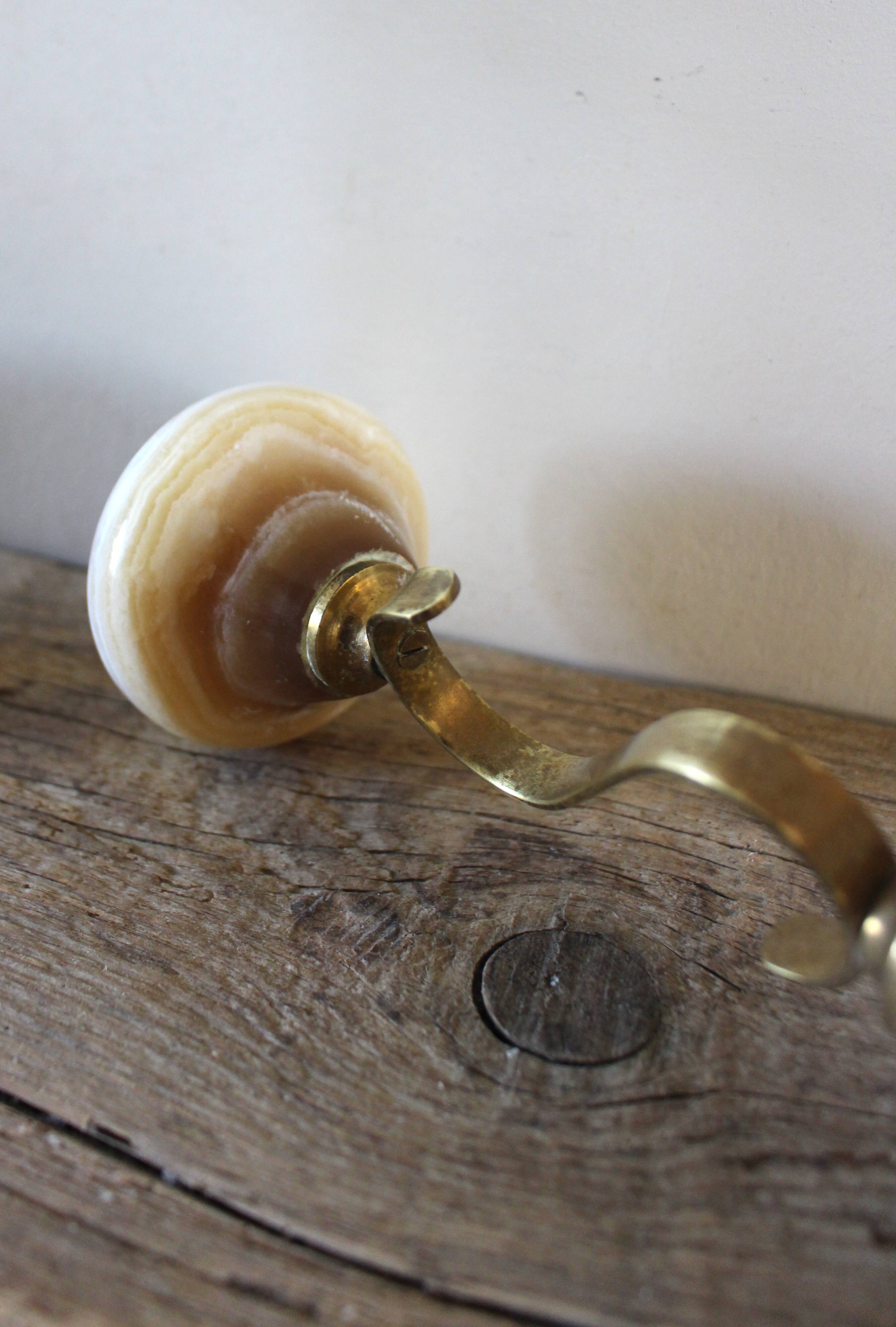 Curved brass and onyx candlestick