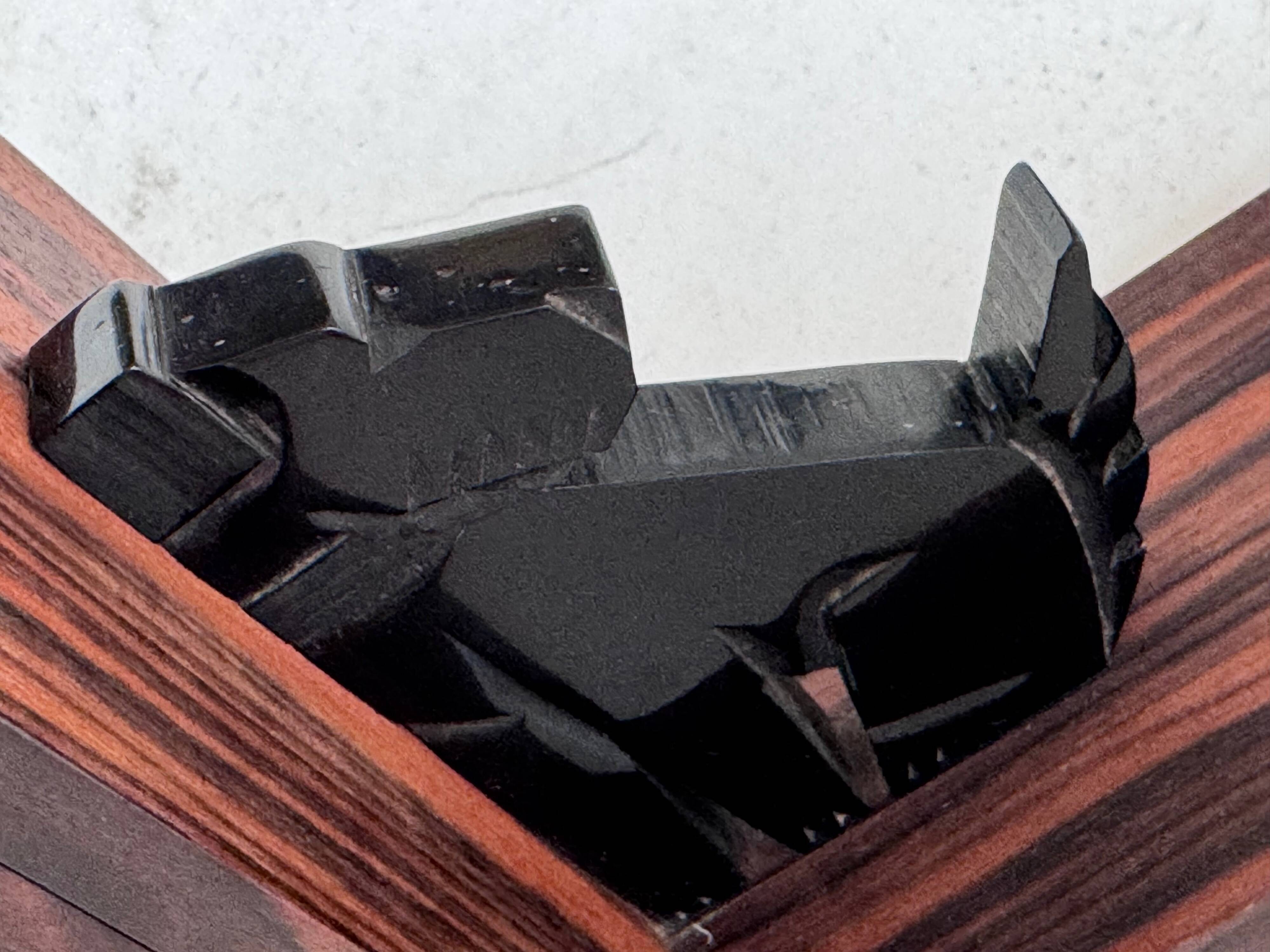 Art Deco bookends in rosewood and Bakelite