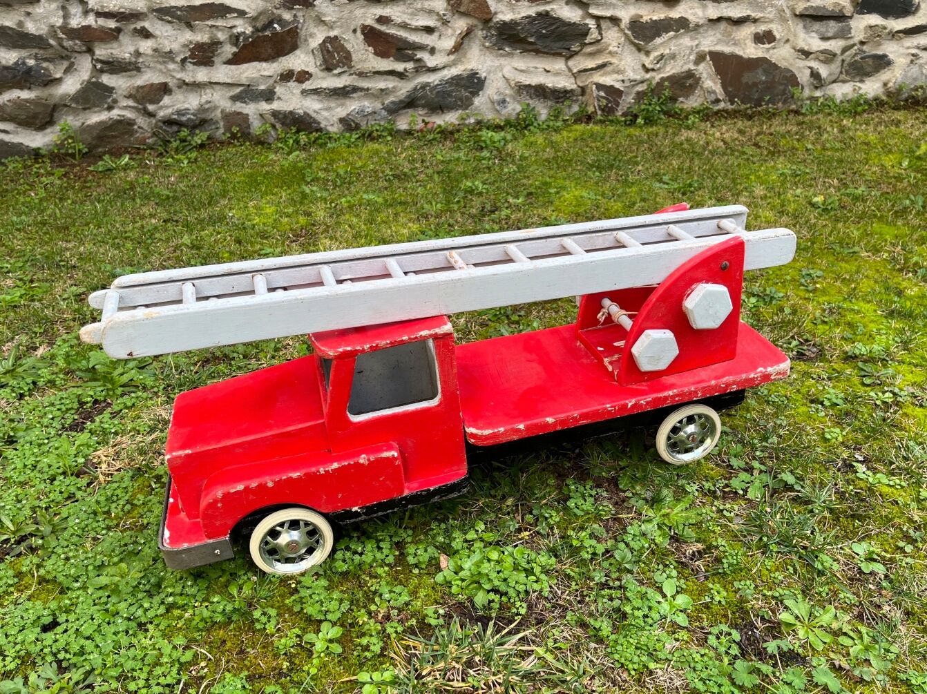 Fire truck with wooden ladder
