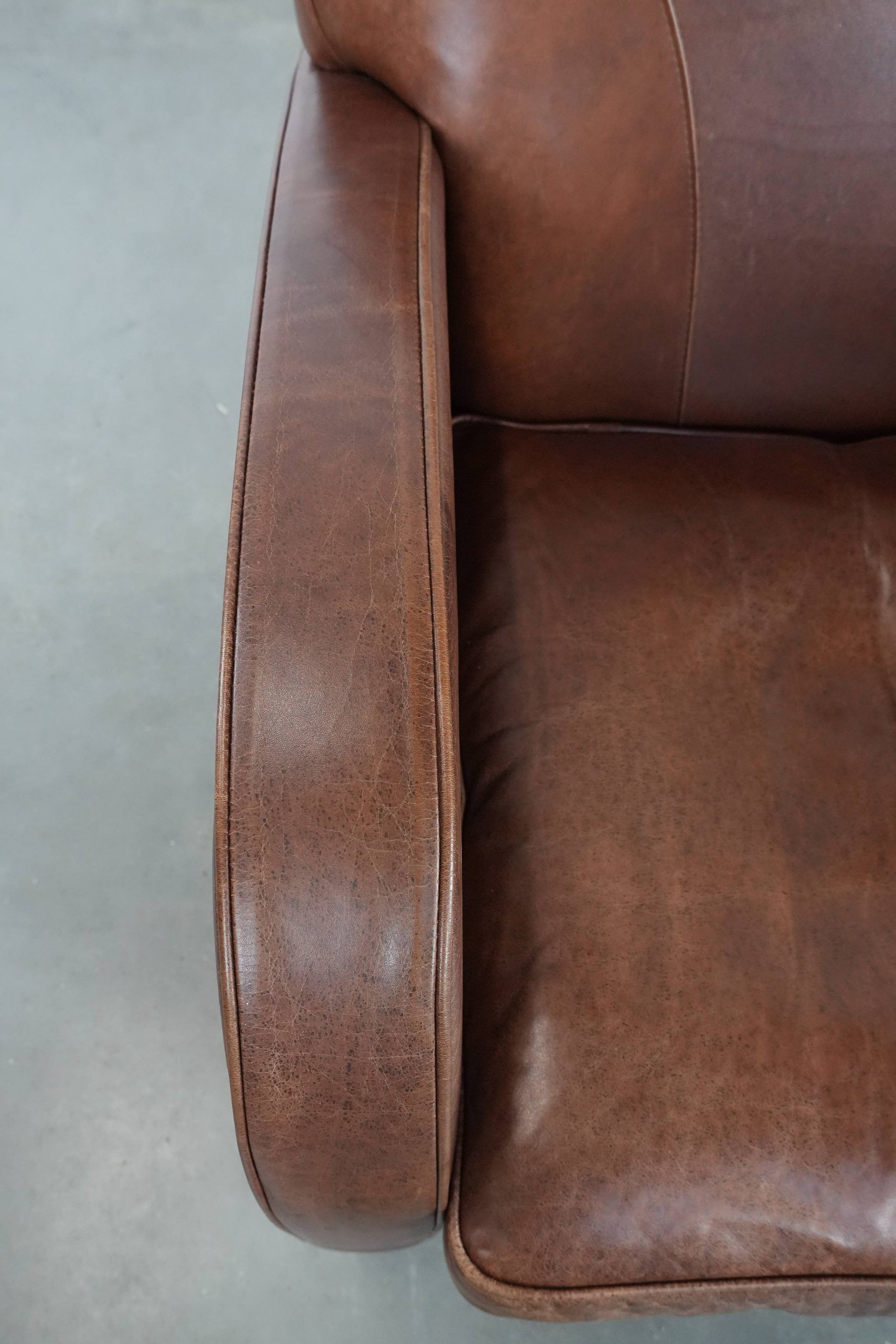 Beautiful art deco design armchair made of cowhide leather in English style