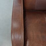 Beautiful art deco design armchair made of cowhide leather in English style