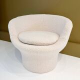 Round armchair in the style of Paulin