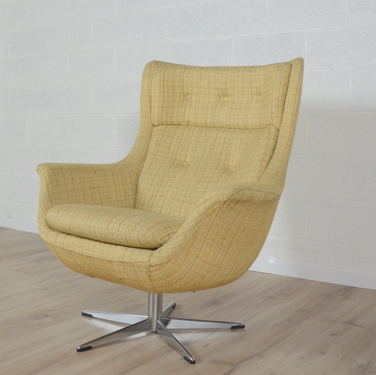 Large vintage swivel shell chair