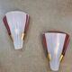 Pair of brass wall lights in Mid Century Modern style attributed to Stilnovo.