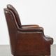 Vintage sheepskin armchair in a dark cognac colour with a comfortable seat