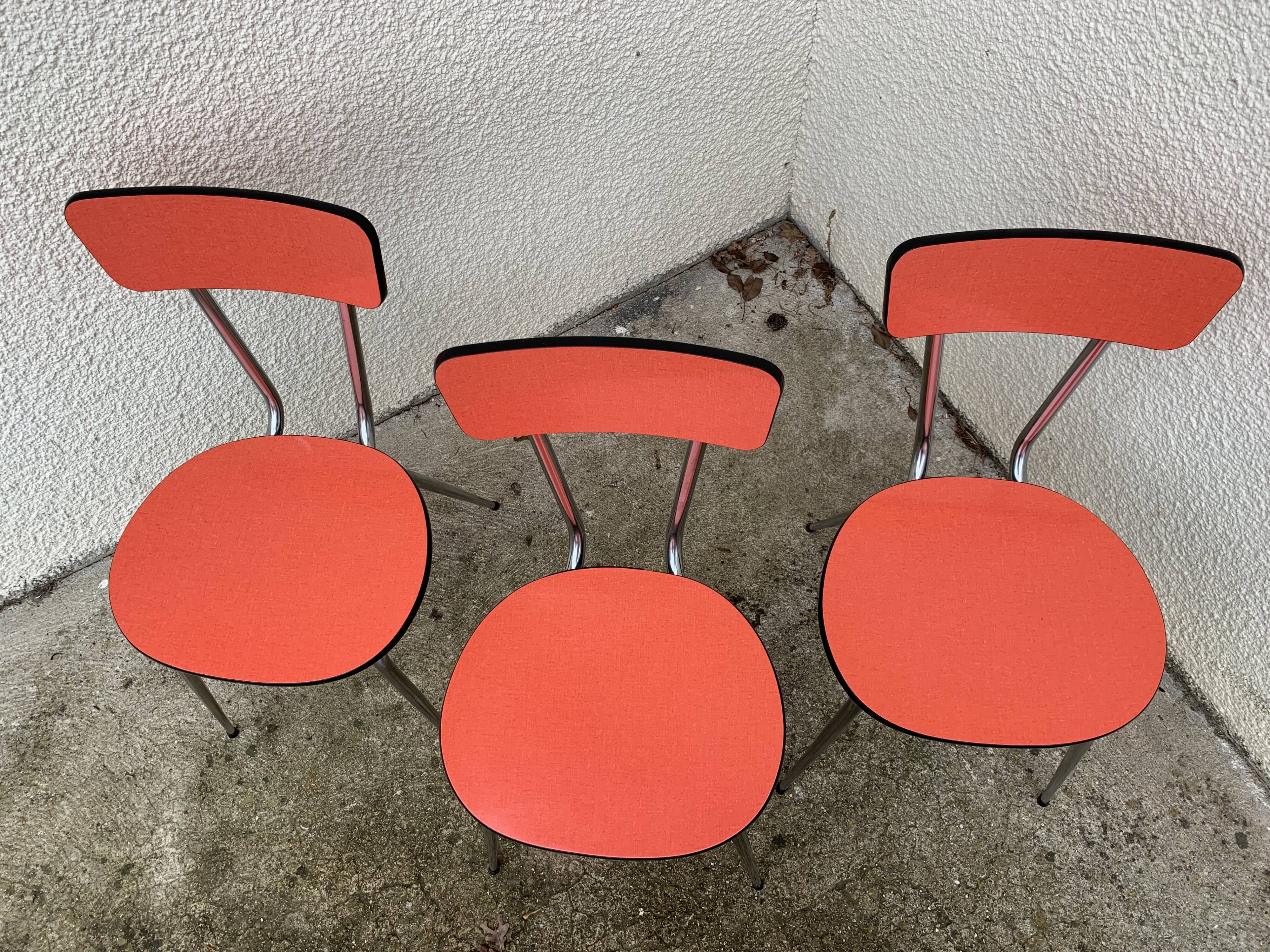 Red formica chairs 1950