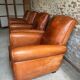 Lot de 4 fauteuils club, Cognac