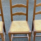 4 straw and solid wood chairs with high backs