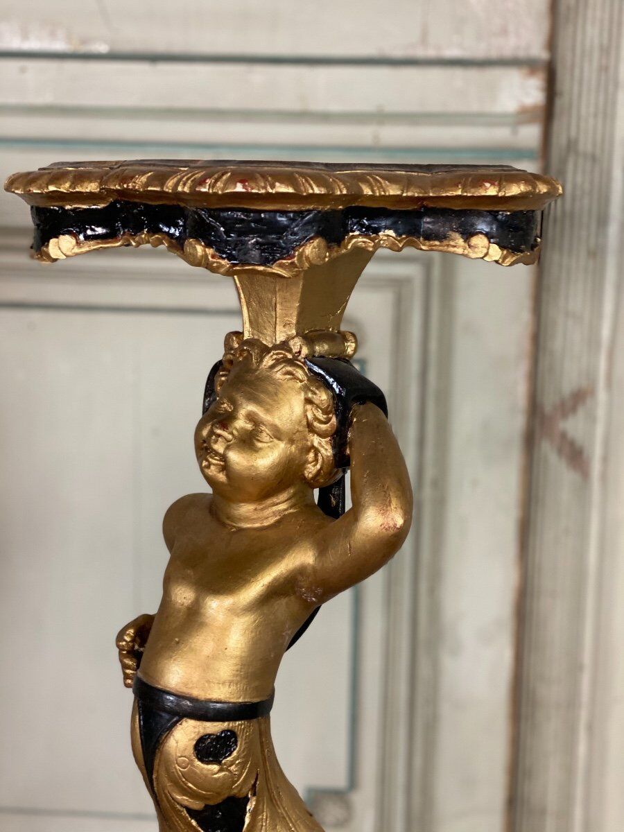 Pair of carved wooden pedestals, black and gold patina circa 1900