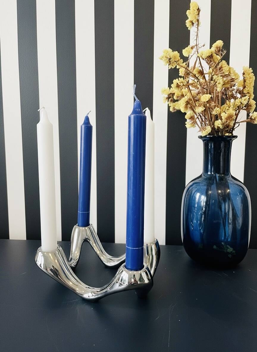 Quatra Chrome candlestick chandelier inspired by "Cobra"