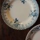 A set of 4 flat plates Terre de fer mismatched blue