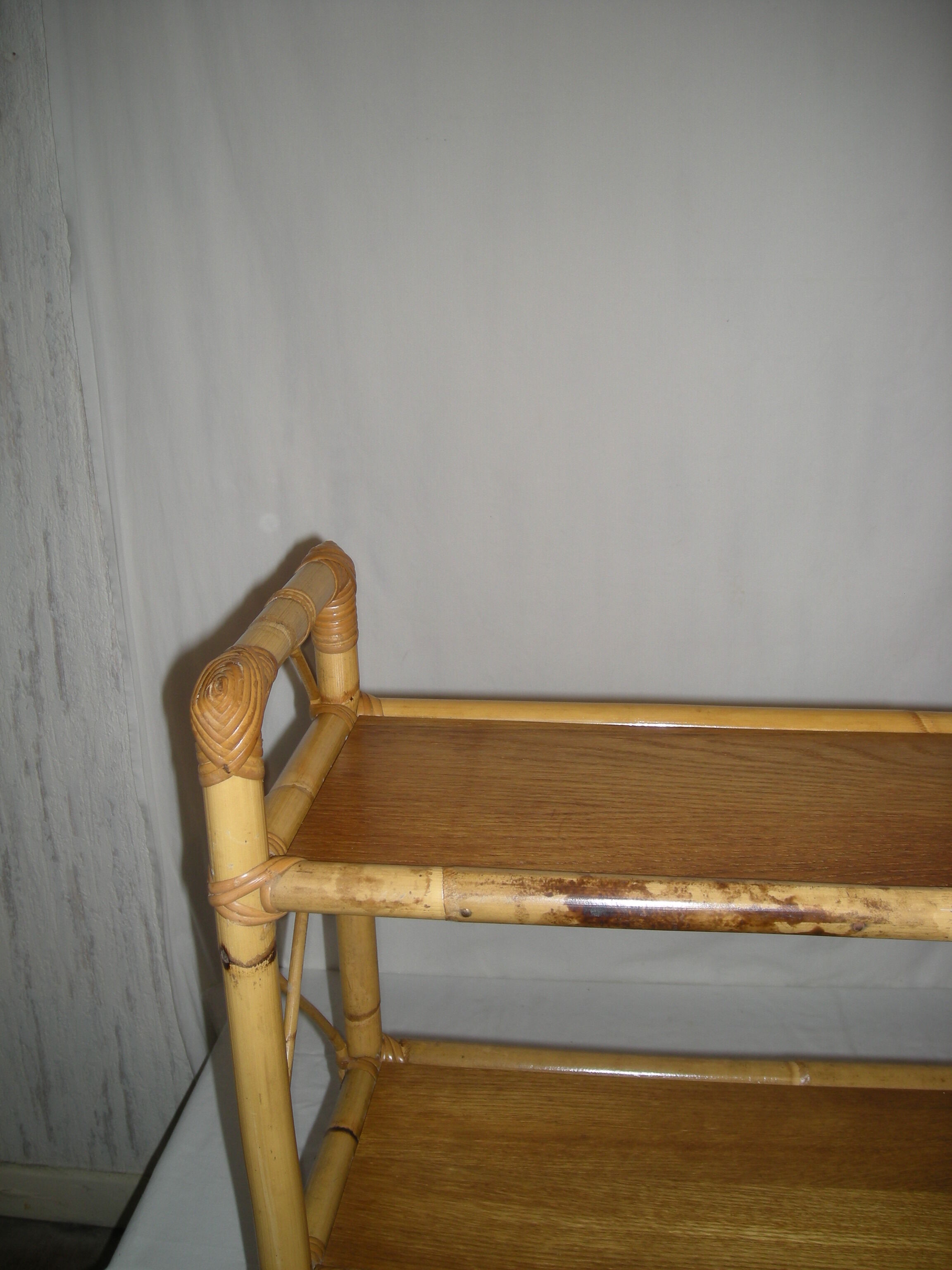 Rattan bamboo shelf on feet from the 50s 60s