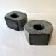Pair of terracotta candle holders with anthracite finish, 1980s.