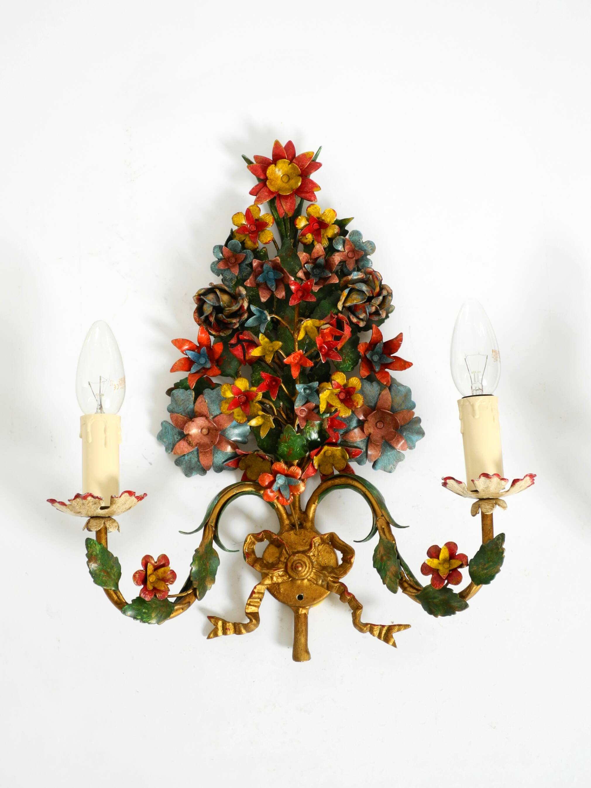 A pair of beautiful 1960s hand-painted and gilded metal wall lamps by Hans