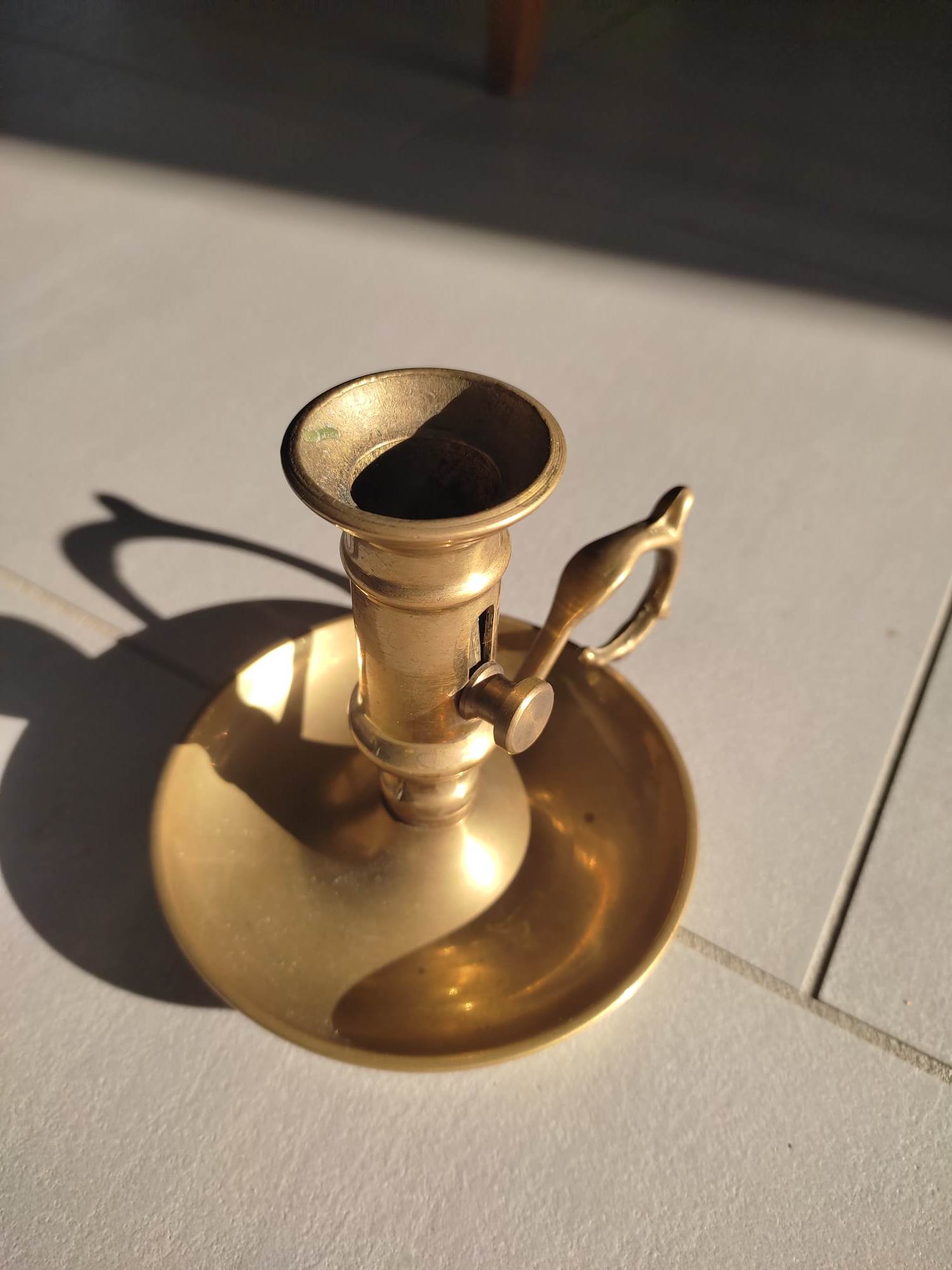 Brass table candle holder with candle push system