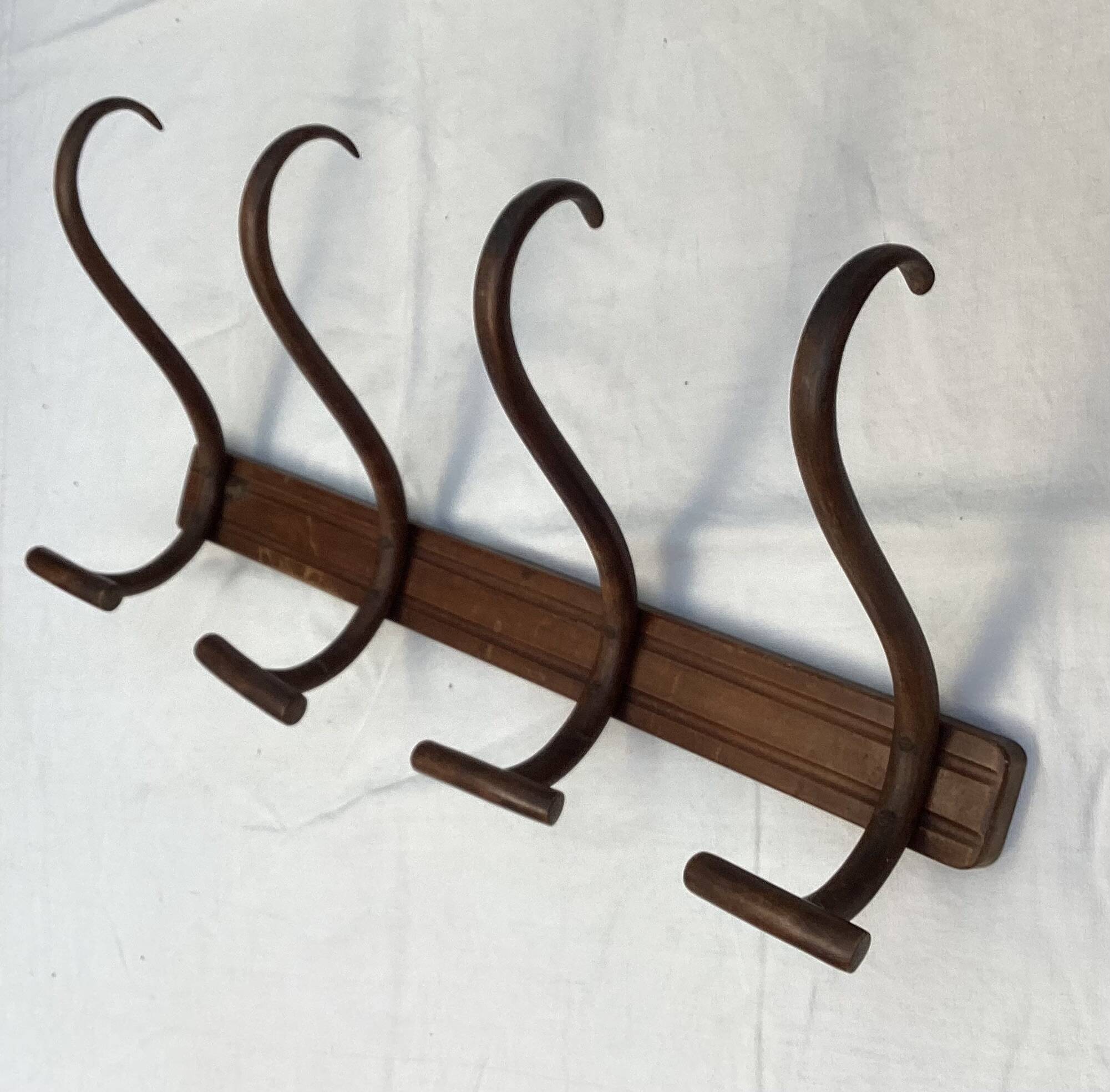 Coat rack signed Thonet with four hooks dimensions: height -32cm - width - 69cm-