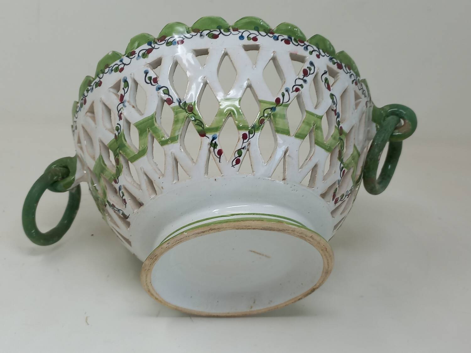 Openwork earthenware fruit bowl with olive decoration, 20 cm in diameter