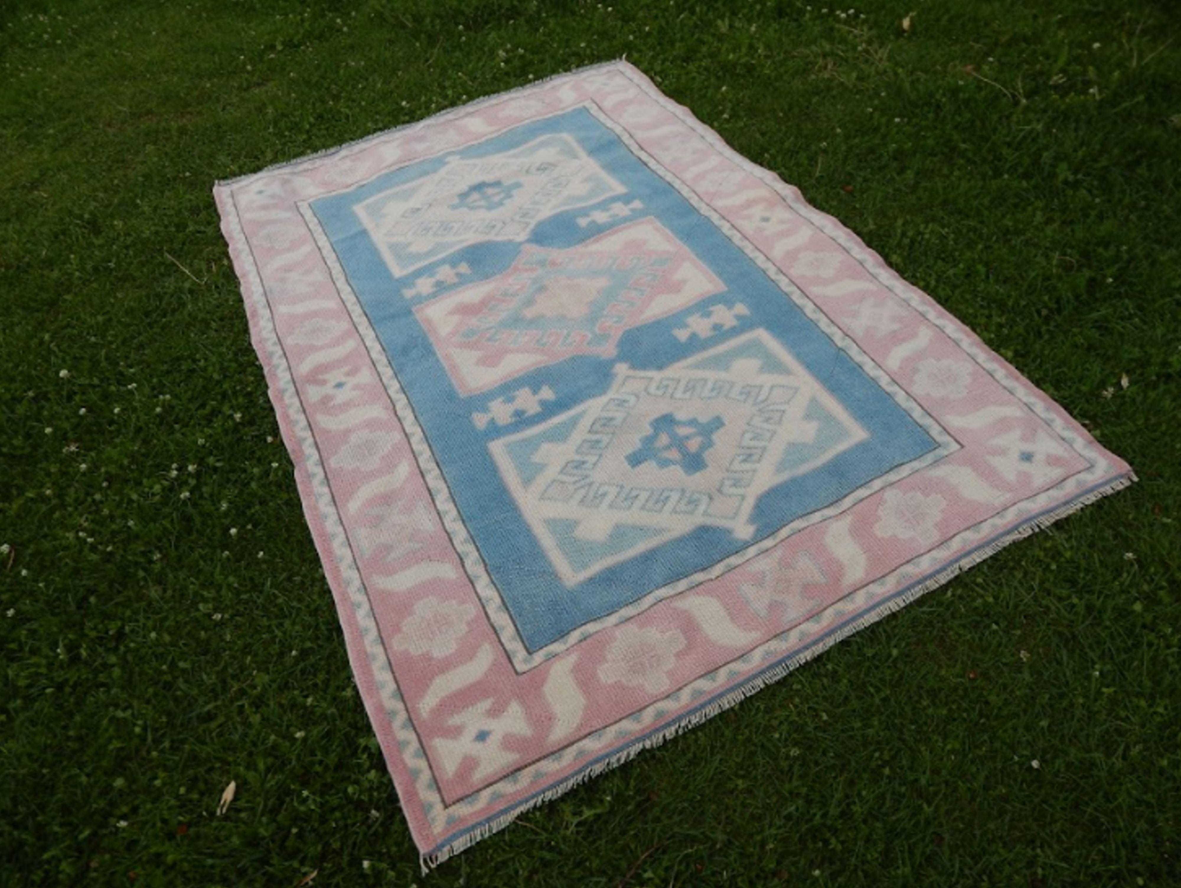 Turkish kars rug with rich border - 4′2″ × 6′2″ (128 x 188 cm)