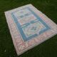Turkish kars rug with rich border - 4′2″ × 6′2″ (128 x 188 cm)