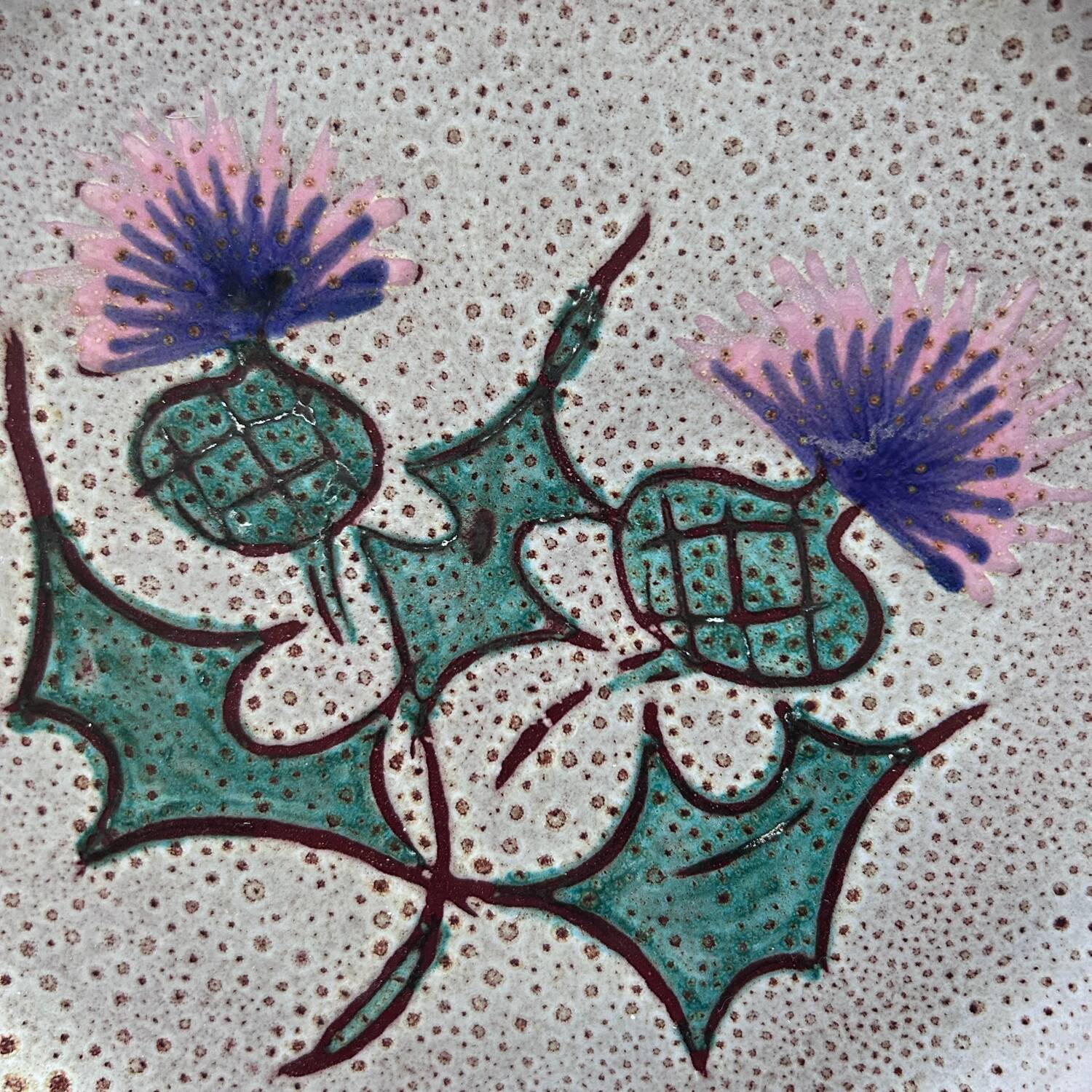 Pair of plates with thistle decoration