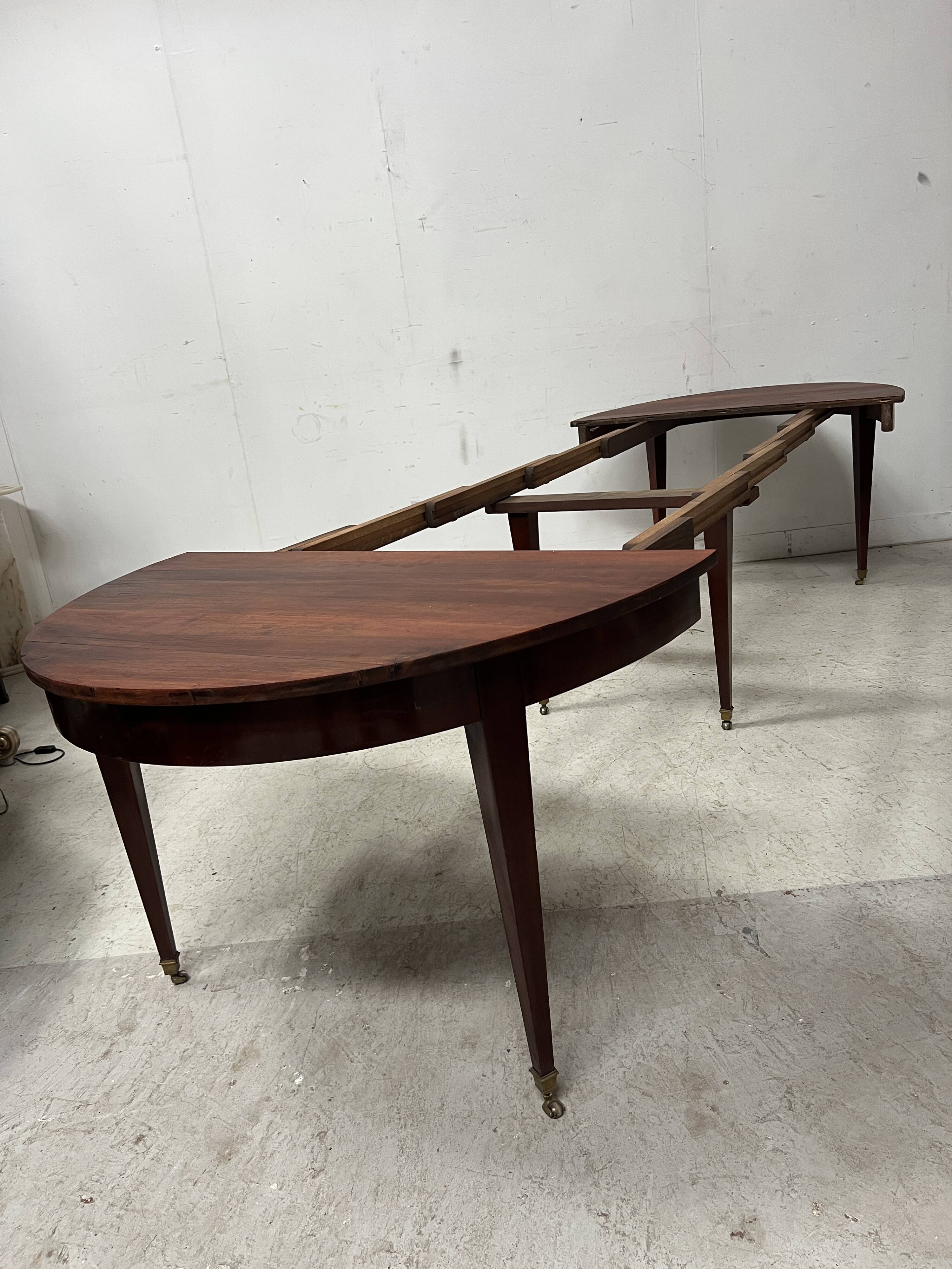 Louis XVI style bandeau table with 6 XIX century tapered legs.