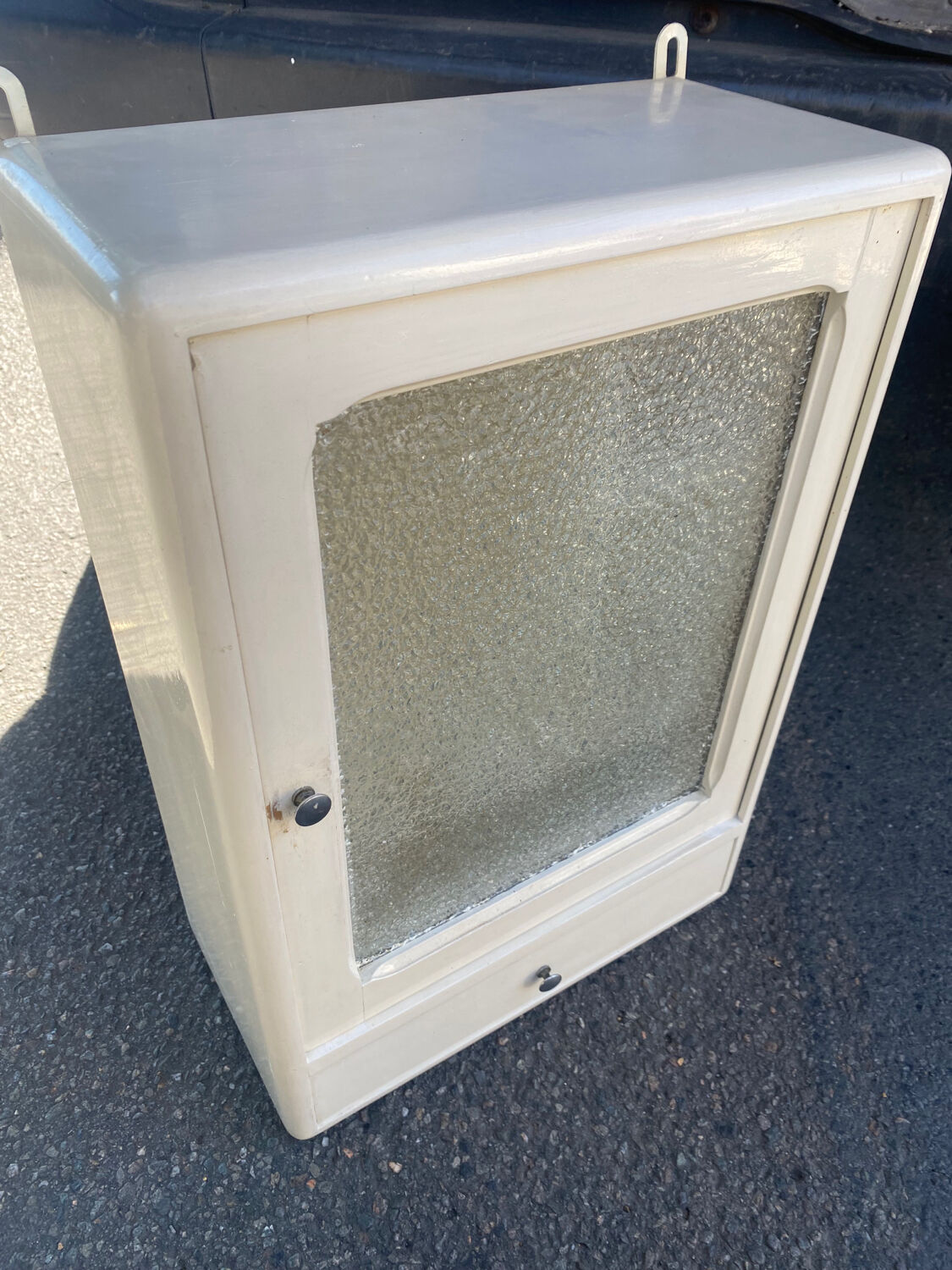 Old small wooden cabinet from the 50s vintage