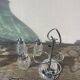 Silver-plated metal and glass salt and pepper shakers