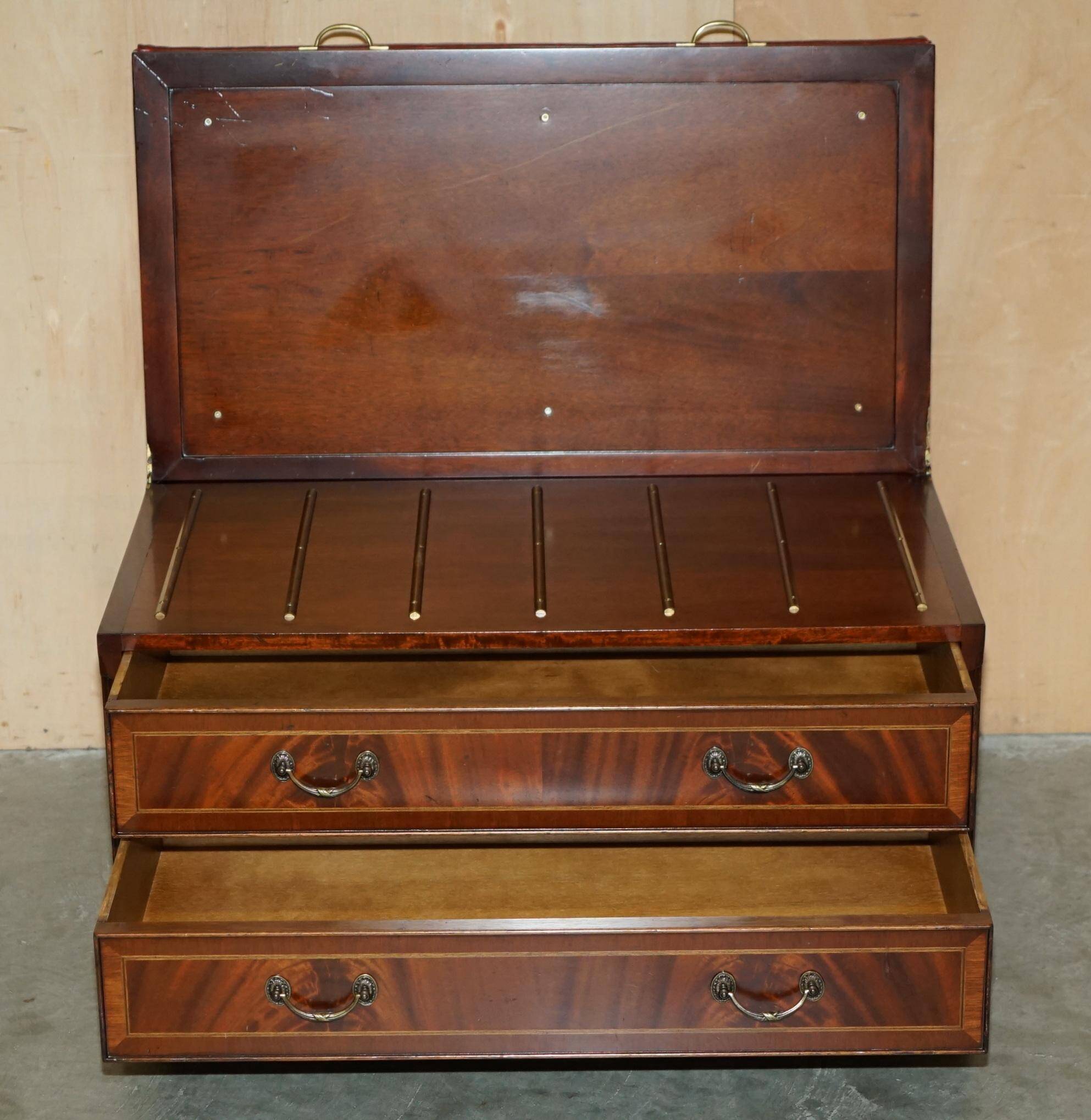 Crocodile leather and hardwood luggage rack in Mid-Century Modern style