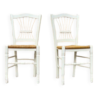 Pair of vintage wood and straw chairs