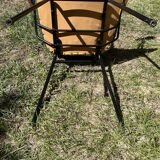 50s chair with armrests.