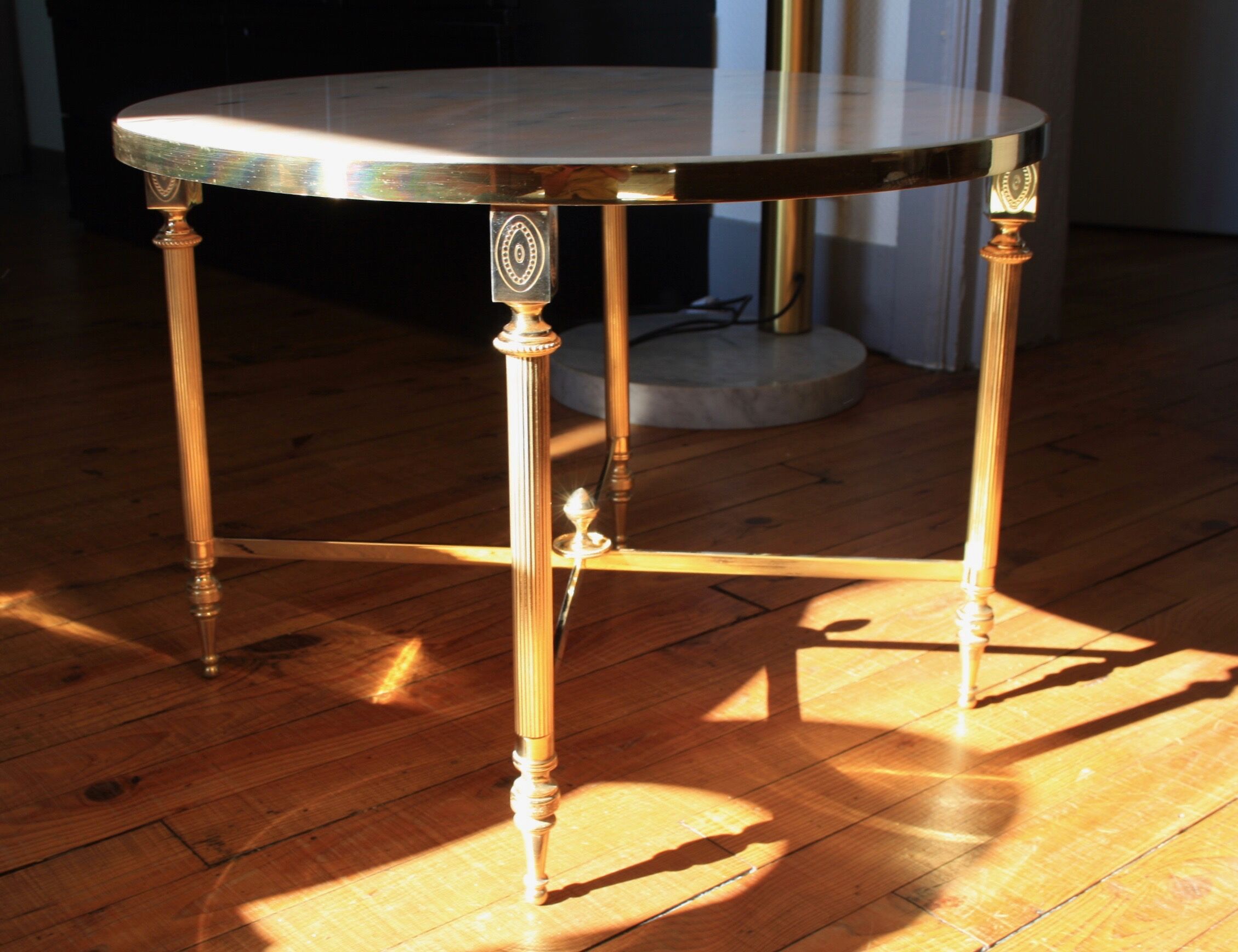 Marble and brass round coffee table
