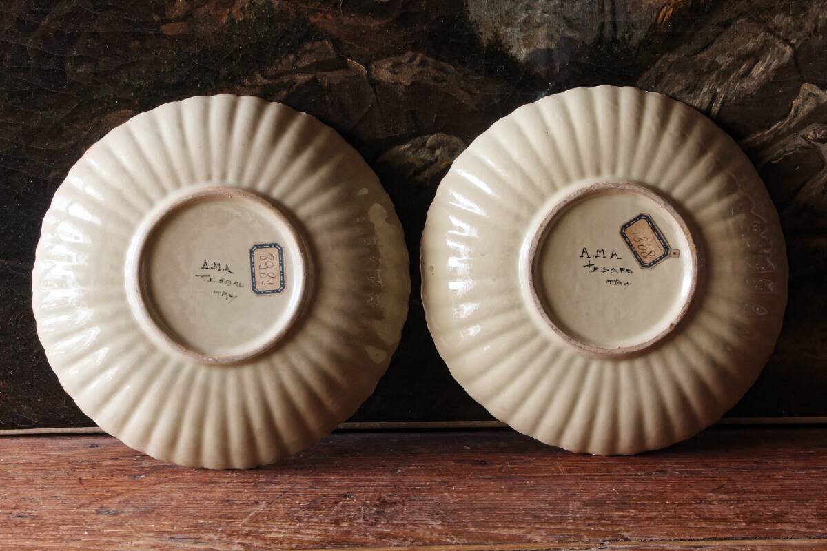 Set of two earthenware plates from Pesaro, Italy, early 20th century.