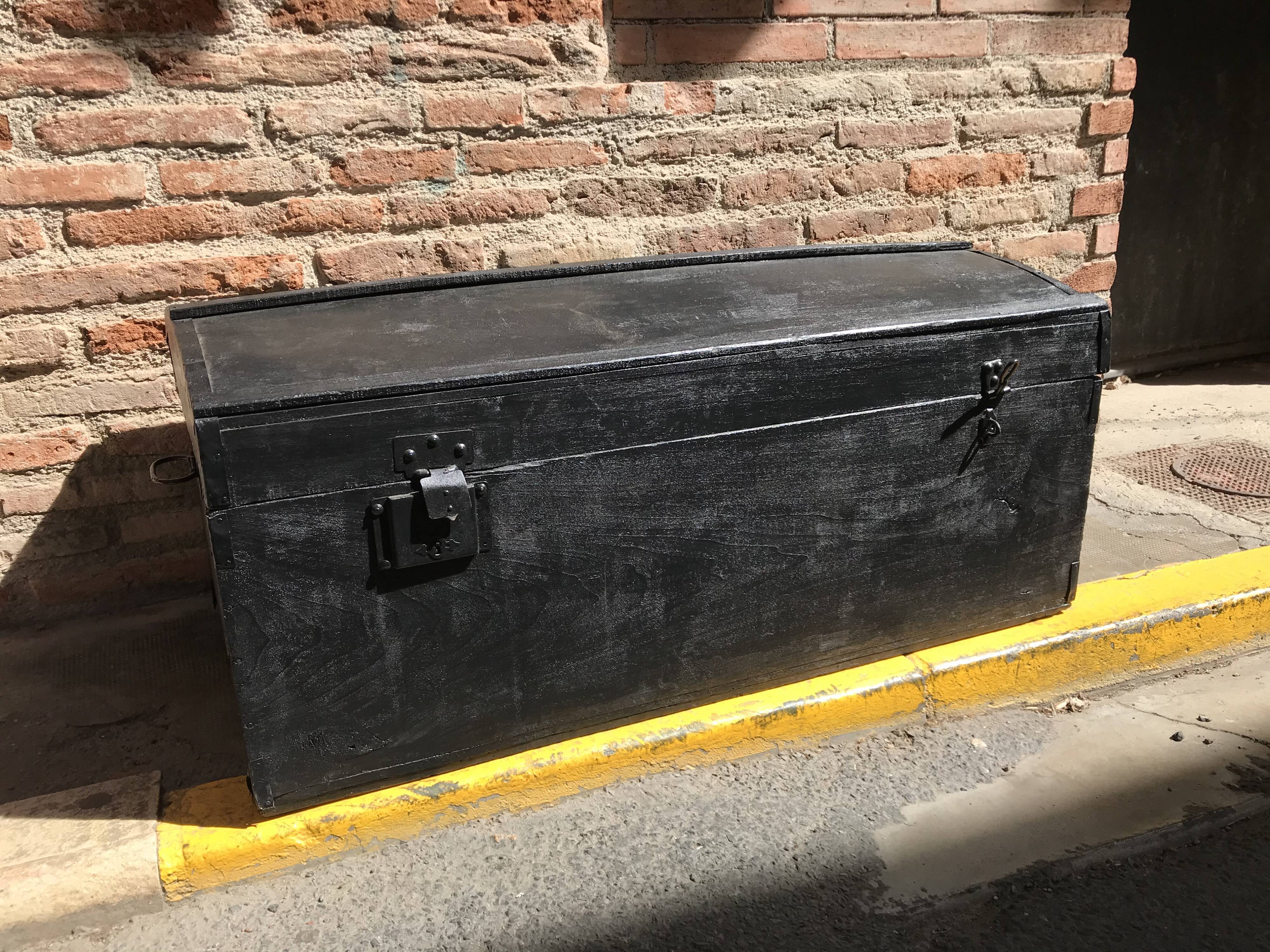Black wooden trunk