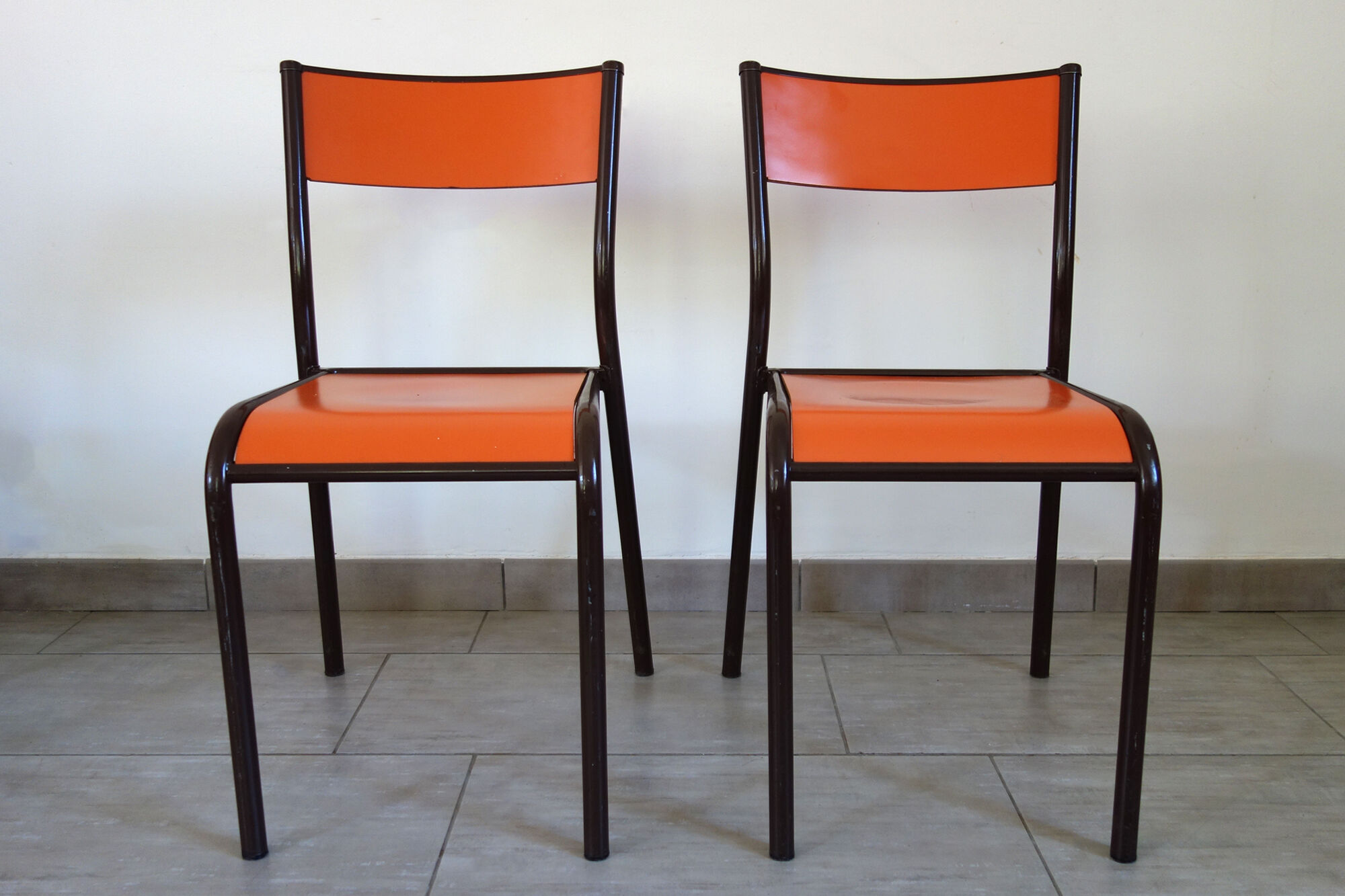 Set of 4 orange school chairs