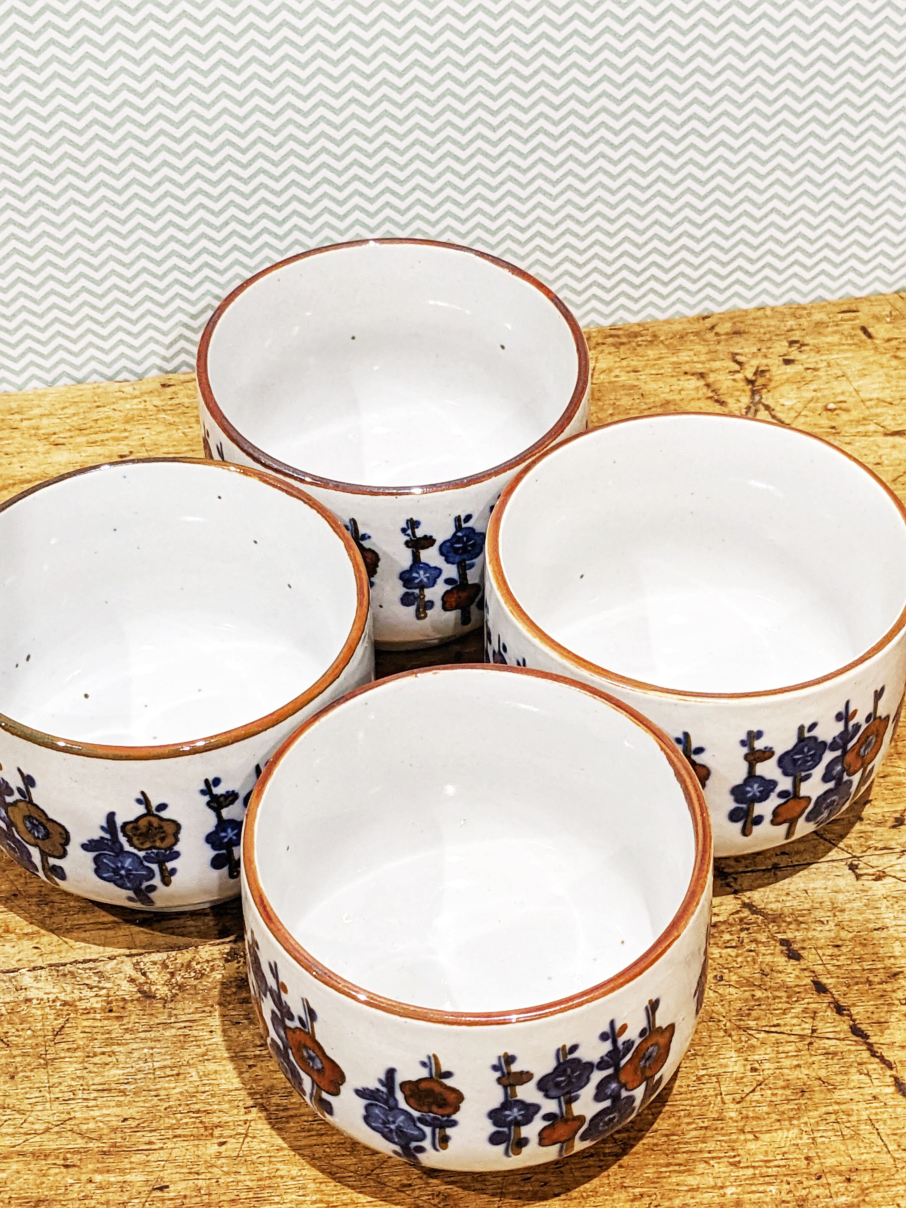 4 tea cups with delicate floral pattern