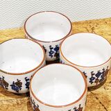 4 tea cups with delicate floral pattern