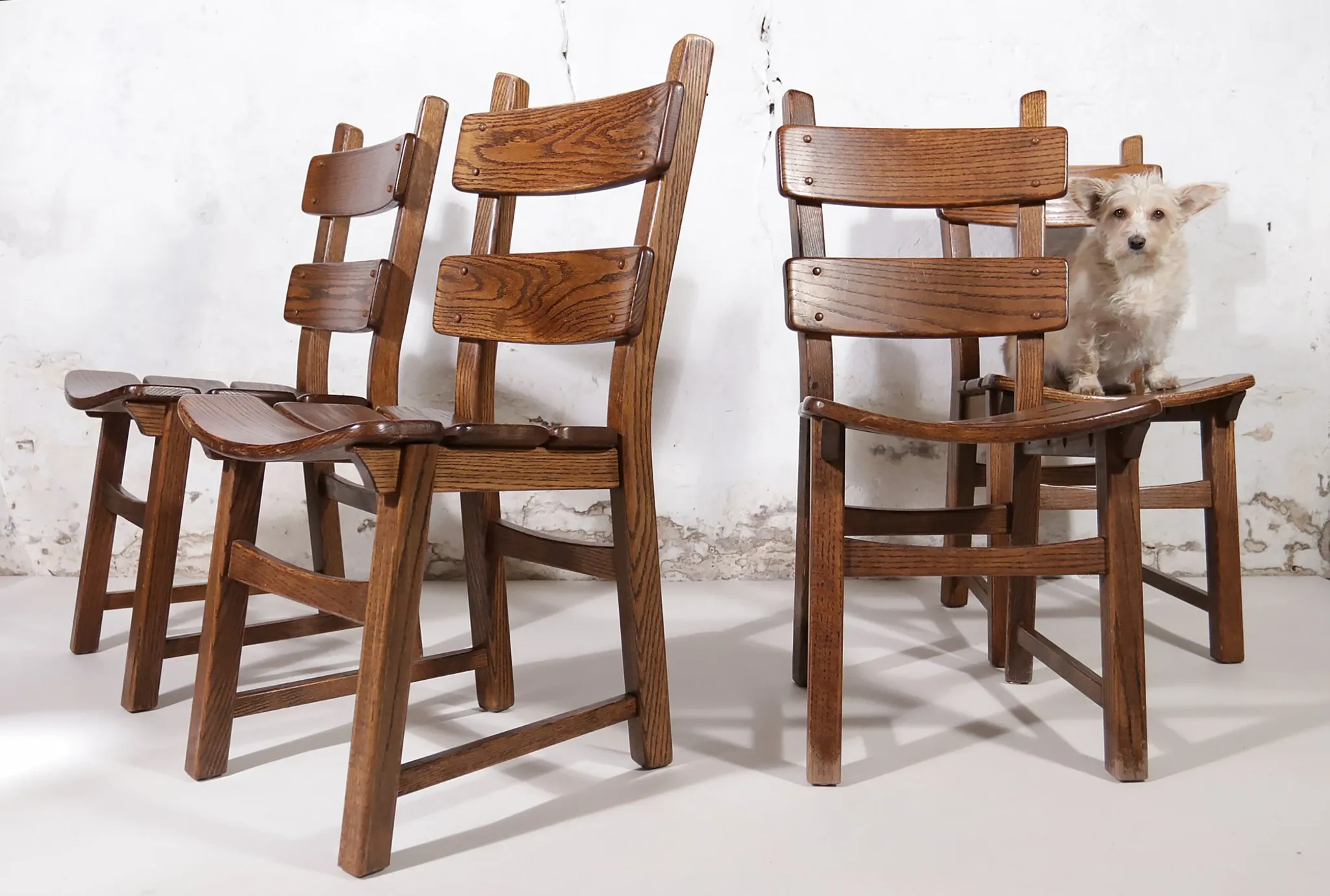 Set of 4 brutalist oak ladderback dining chairs – Netherlands, 1970s