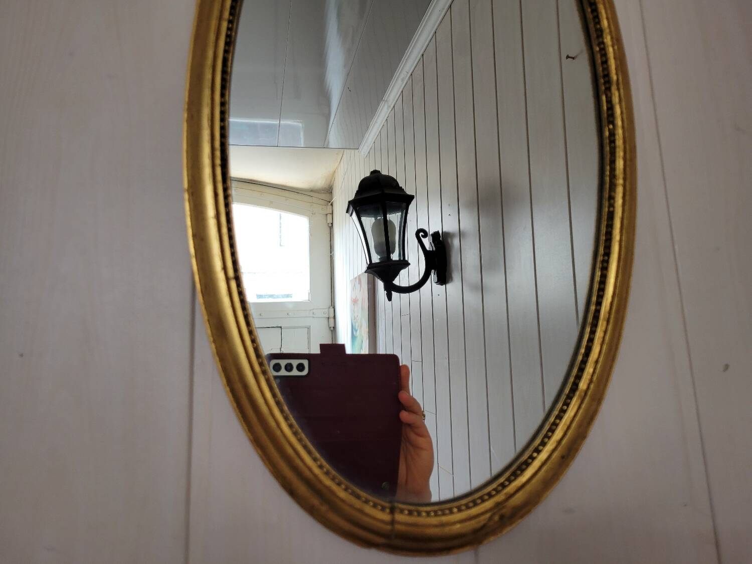 Louis XVI style oval mirror