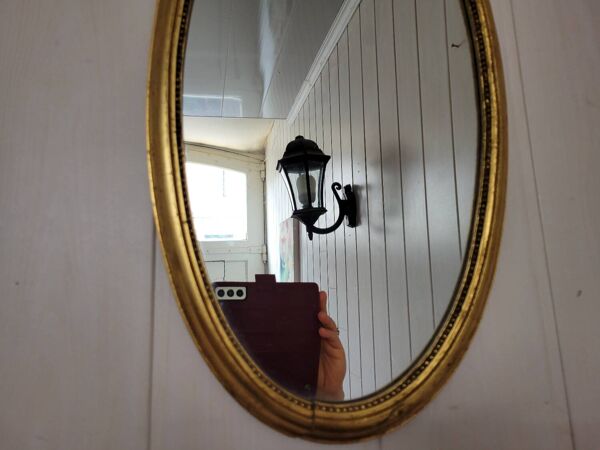 Miroir ovale style Louis XVI