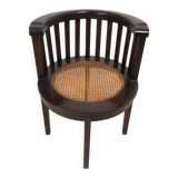 Colonial "Art Deco" armchair in wood and cane.