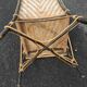 Antique high-back rattan armchair