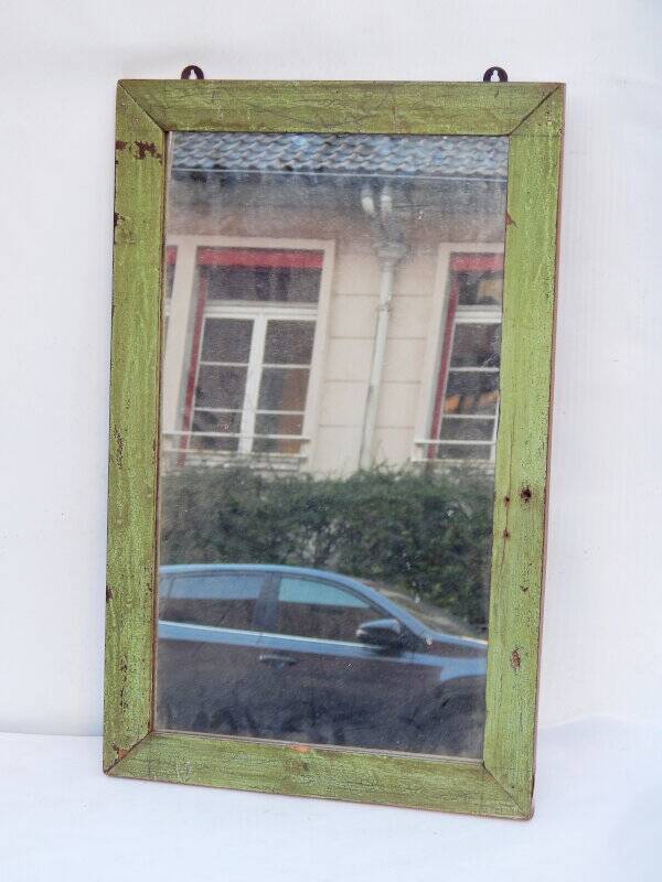 Old tech green mirror