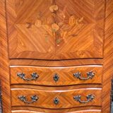 Old French secretary in bronze and wood marquetry.