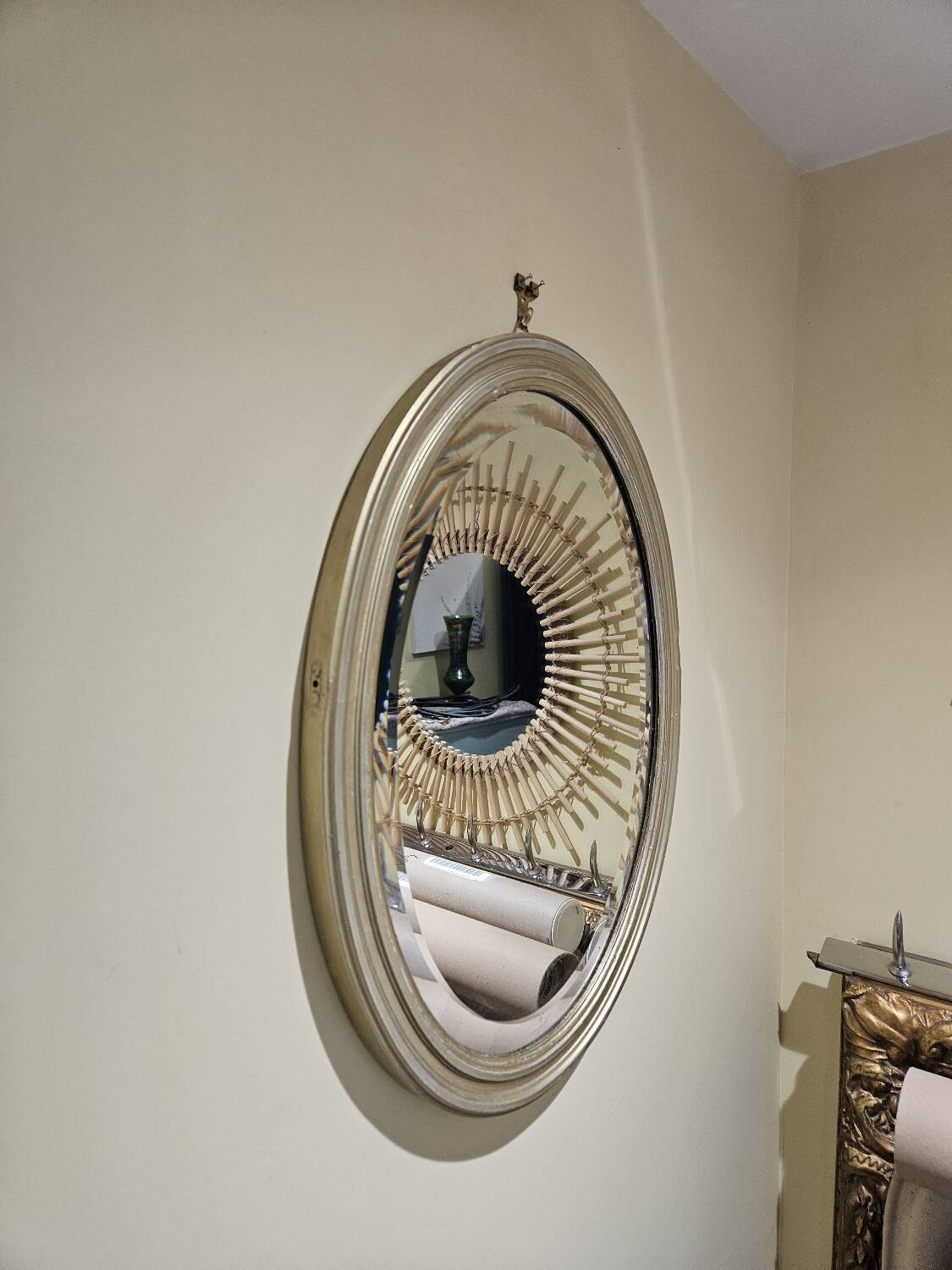 Bevelled oval mirror