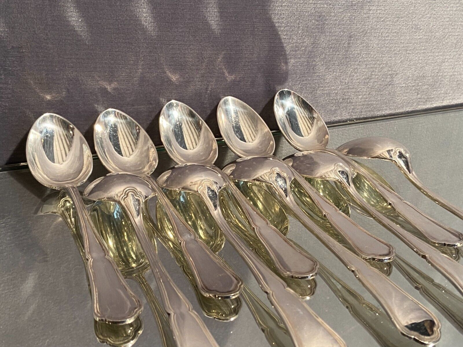 Suite of 10 teaspoons in silver metal model violin net Louis XV
