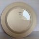 Earthenware plate from Moulin des Loups with stencil pattern.