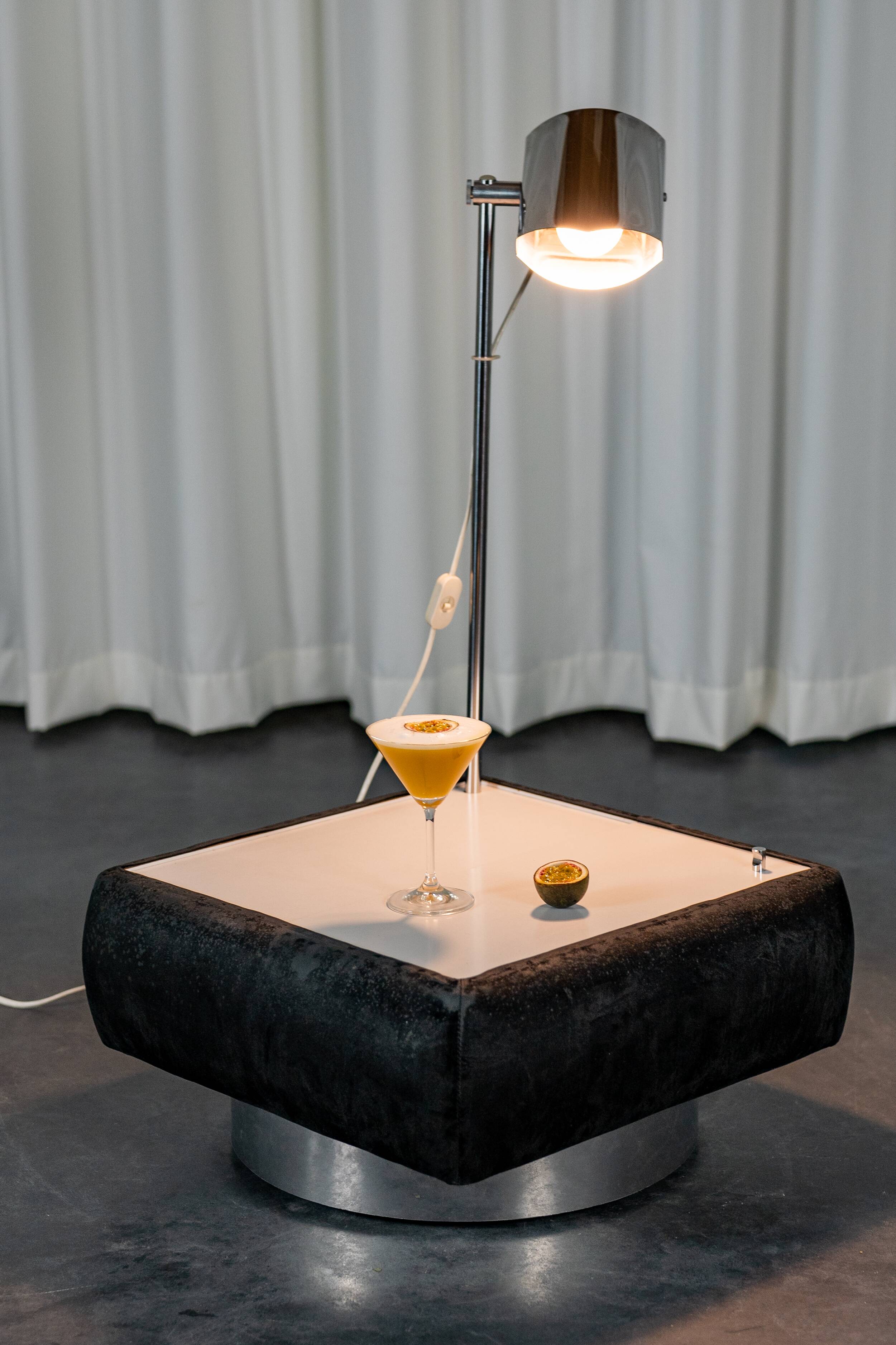 Set of 2 side tables with integrated lamp.