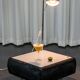 Set of 2 side tables with integrated lamp.