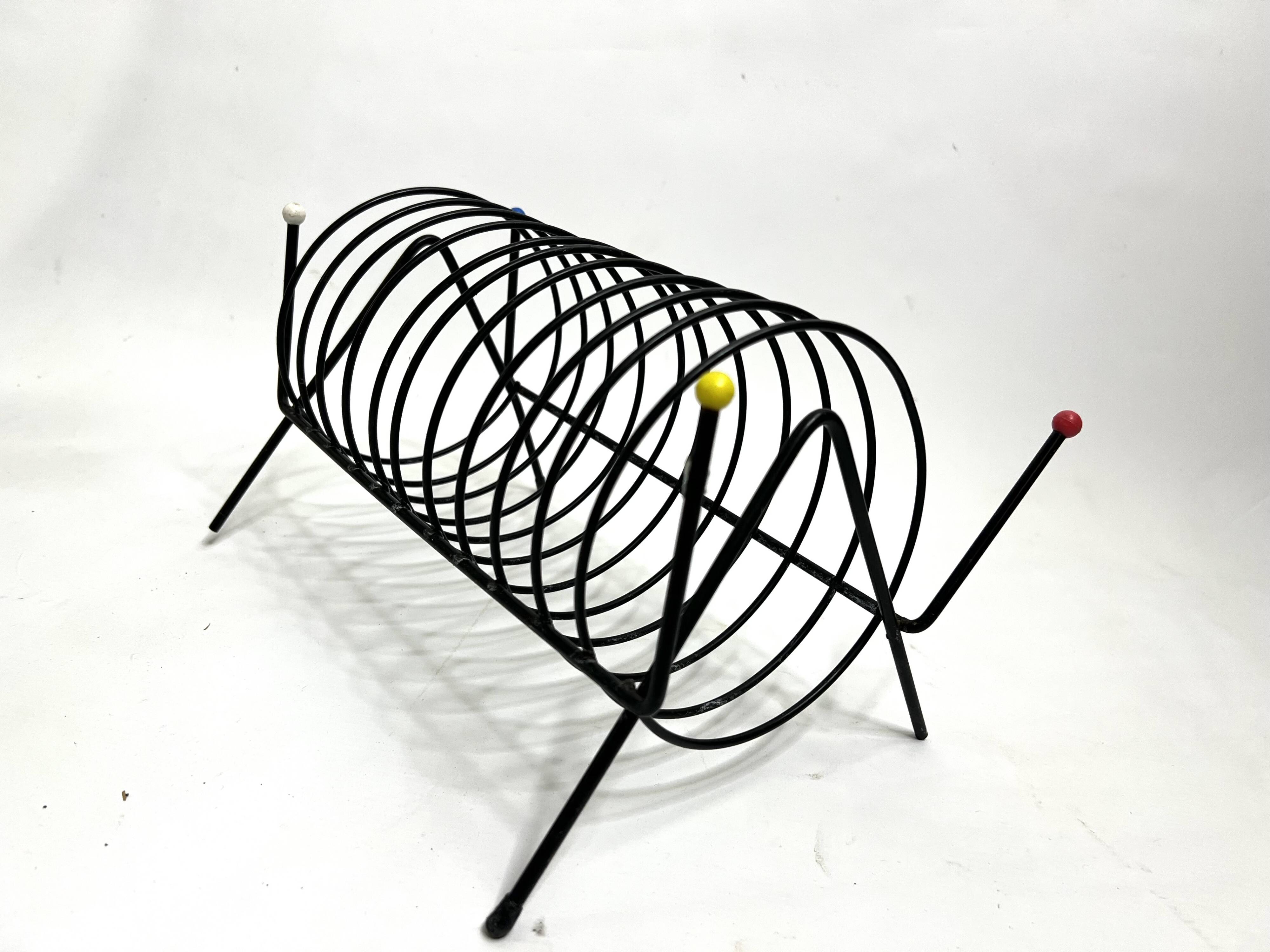 Porte-revues vintage en métal laqué noir – Design 1950s multicolore